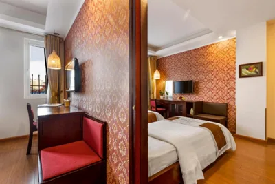 Zwei miteinander verbundene Doppelzimmer — First Eden Hotel - Hang Bun